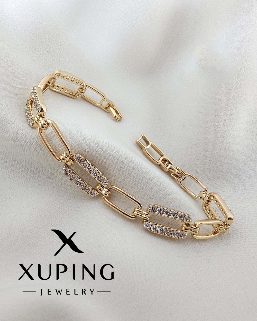 دستبند هرمس درشت ژوپینگ،رنگ ثابت،ضد حساسیت،مشابه طلا،نگین مخراج رفته،برند معتبر ژوپینگ